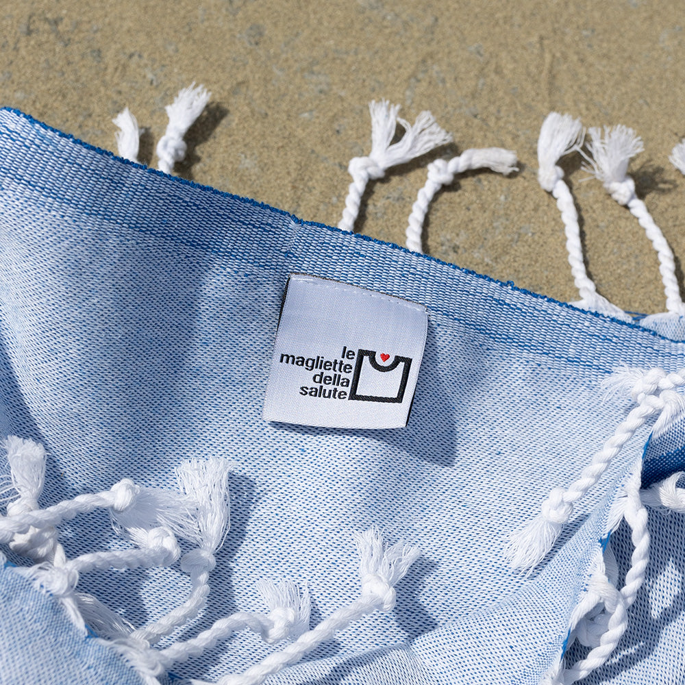 telo mare oggi si muore di caldo dettaglio etichetta